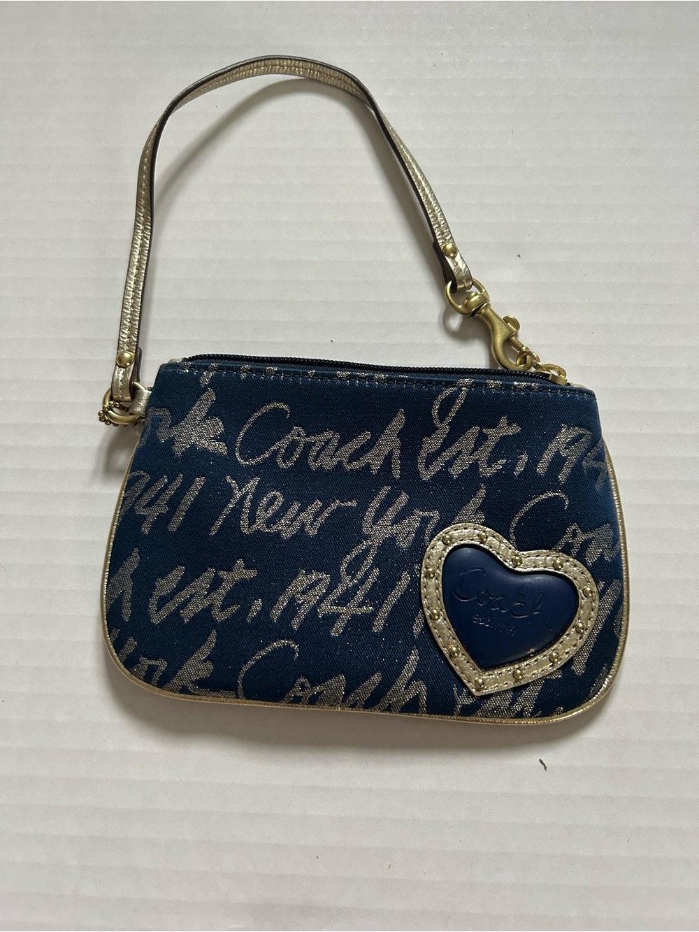 Coach New York Navy and Gold Script Heart Wristlet